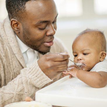 DIT-Dad-in-training-feeding-baby